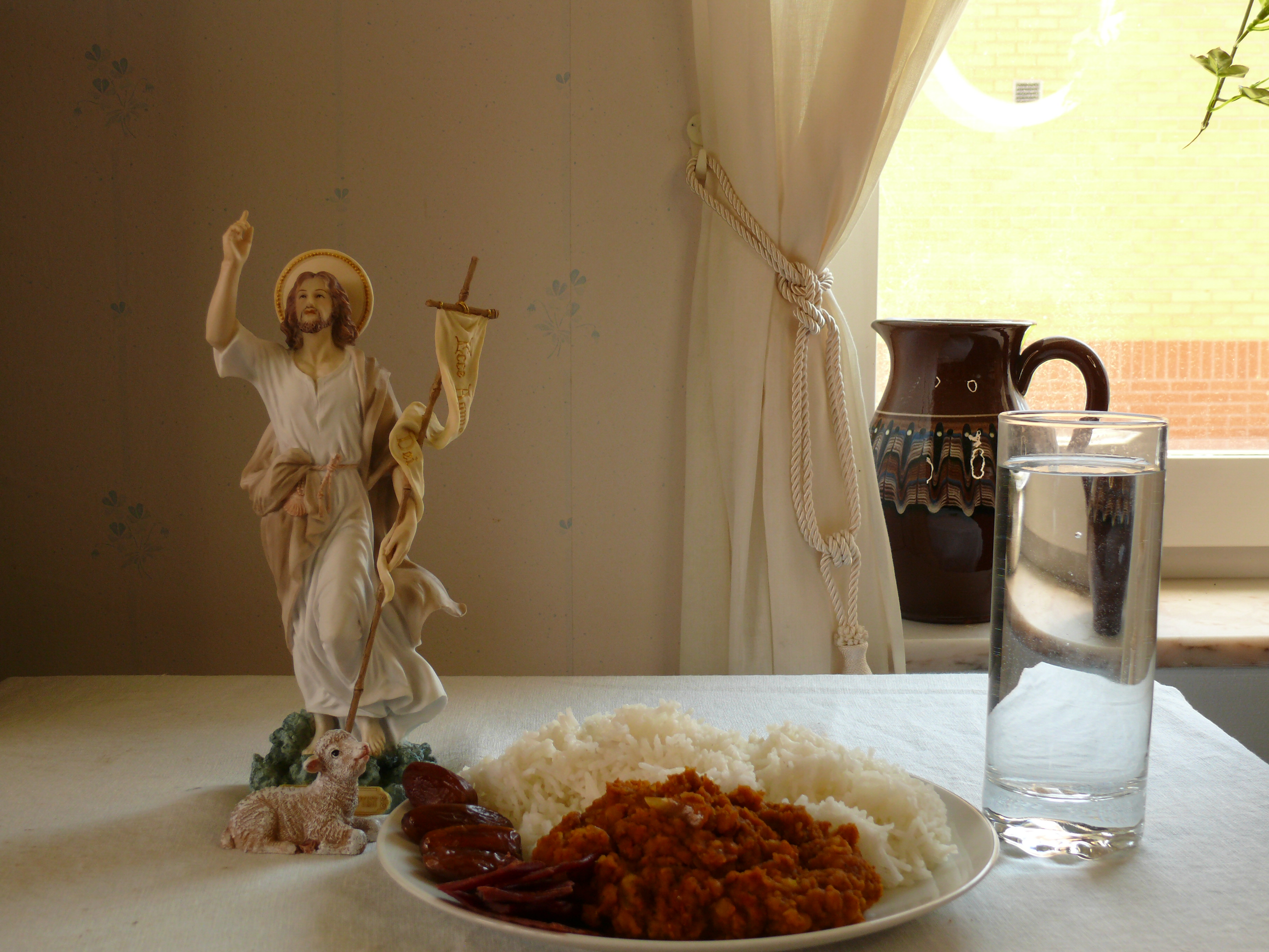 Figurine of John the babtist with desert foods