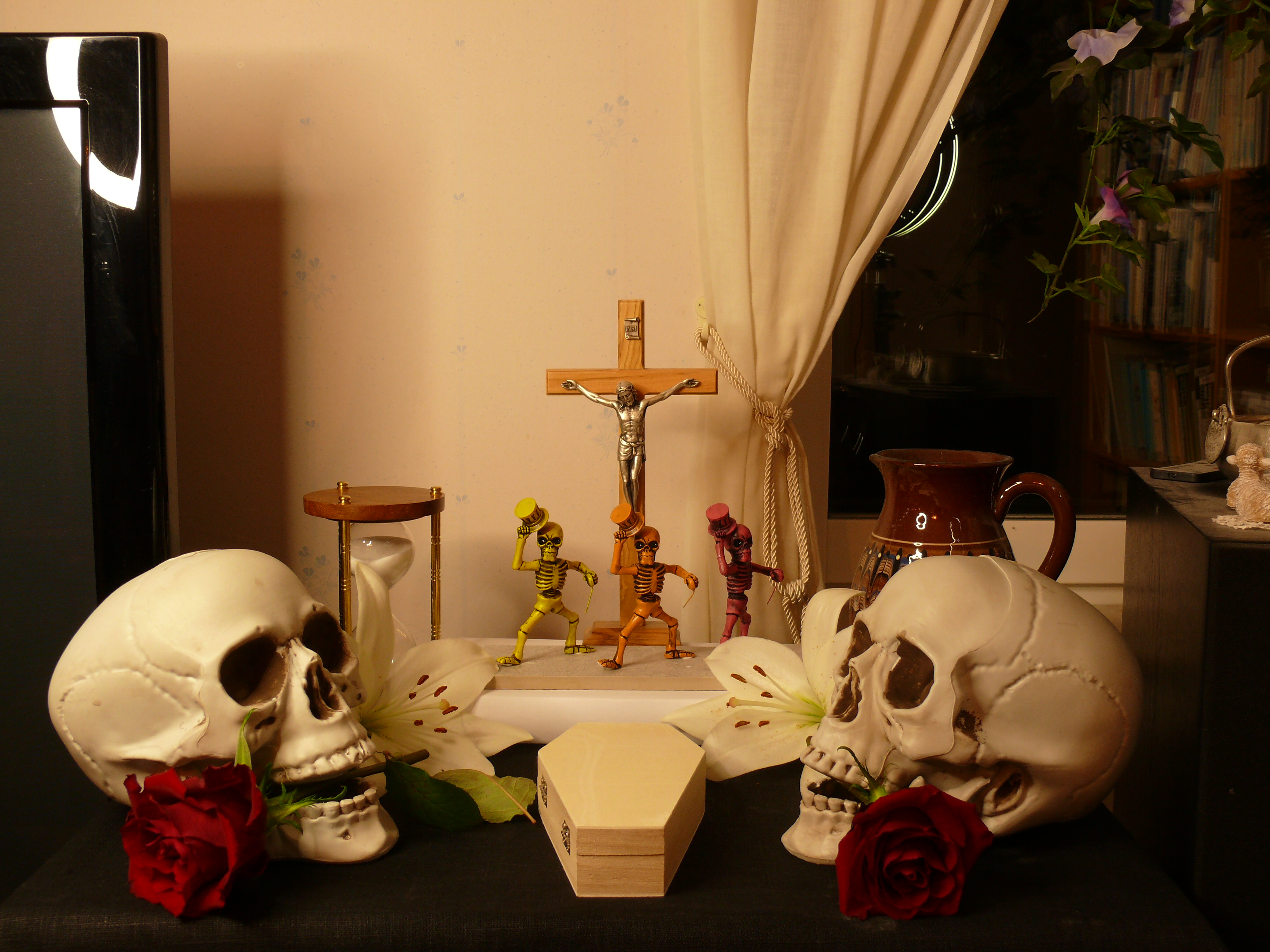 Skull's, a coffin, and a Hourglass